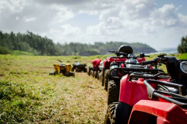 Quad bikes in a row