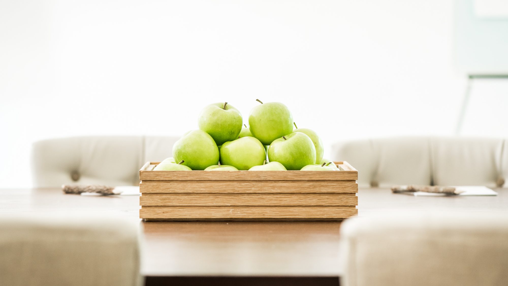 Green apple stack on table