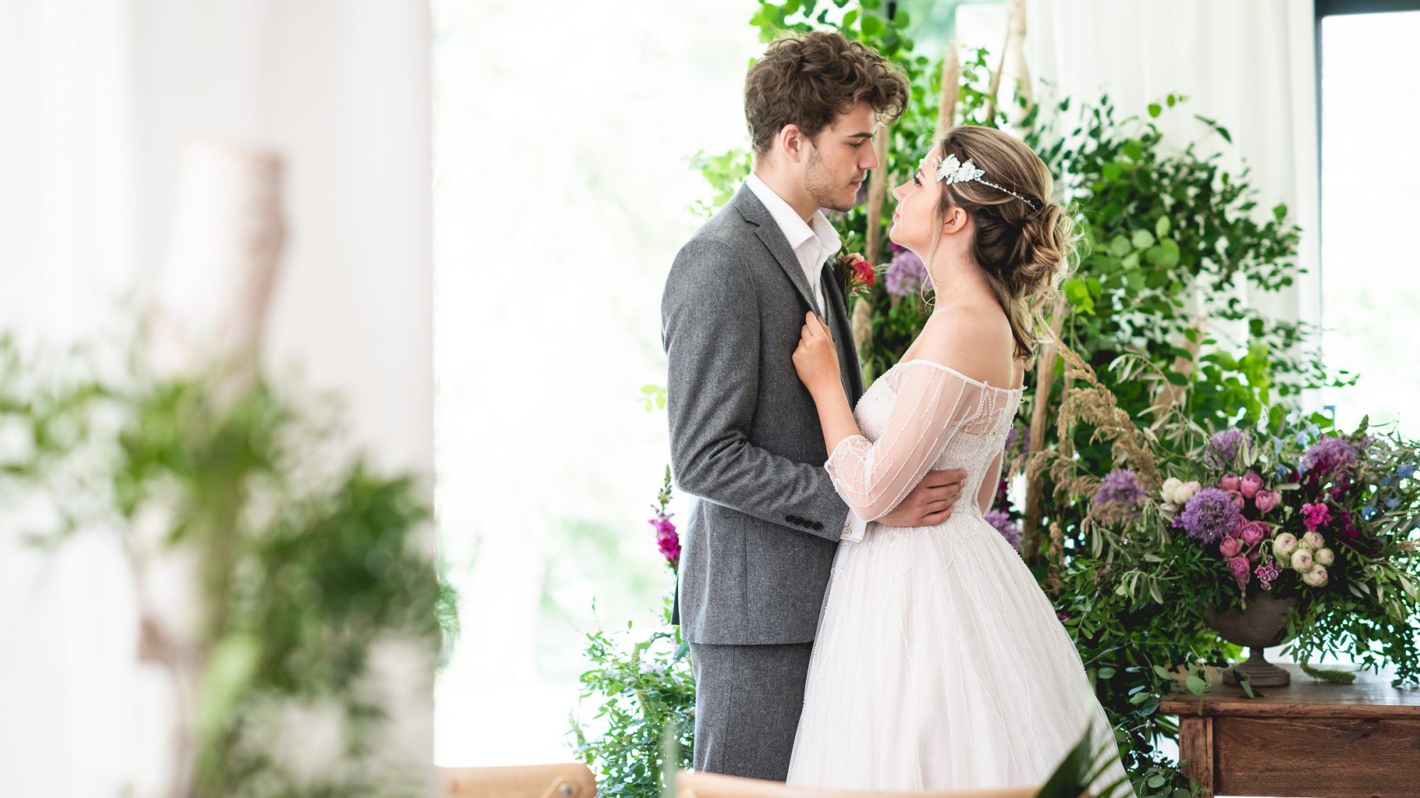 Married couple looking at each other in bright room