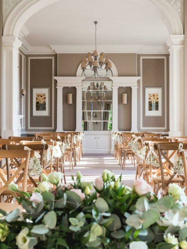 Hothorpe Hall wedding chairs and flowers for aisle